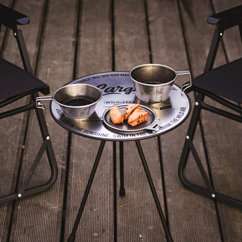Lightweight folding camping table with a spacious aluminum tabletop